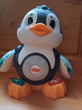 Fisher-Price Singing Penguin Learning Toy - Black, White & Orange